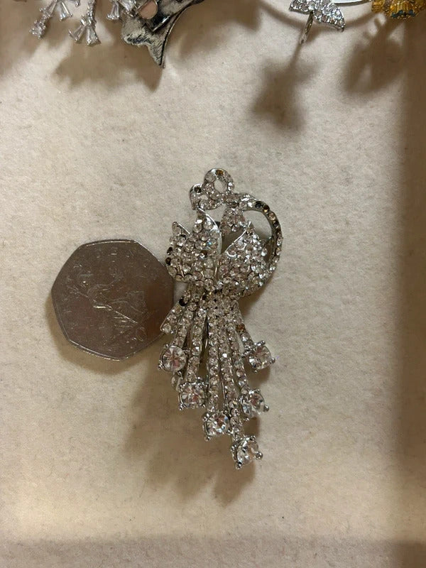 silver crystal angel brooch with dangling rhinestones